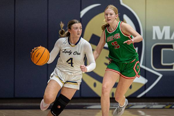 Marquette holds off fourth quarter rally by La Salle-Peru 