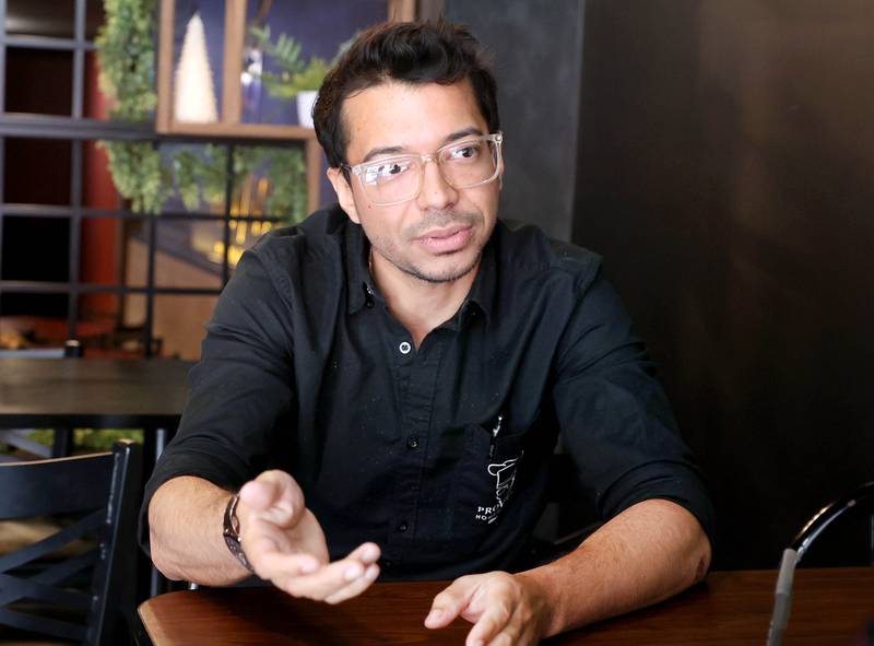 Emmanuel González, owner of Provecho Home Made Food talks Friday, May 22, 2026, at restaurant, about some of the offerings available at the eatery. Provecho is a new Venezuelan homemade food restaurant that has recently opened at 131 East Lincoln Highway, in DeKalb.