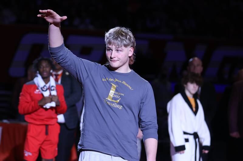 Lockport’s Andrew Blackburn-Forst looks to greet his opponent during the introductions in the championship match at State Farm Center in Champaign. Saturday, Feb. 19, 2022, in Champaign.