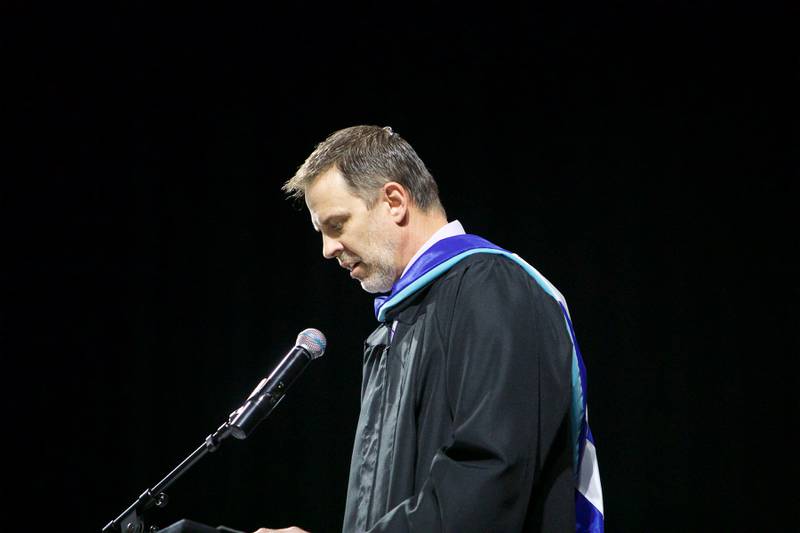 Associate Principal Nate Danielson congratulates the graduating class at the Hampshire High School graduation ceremony on May 21, 2022, at the NOW Arena in Hoffman Estates.