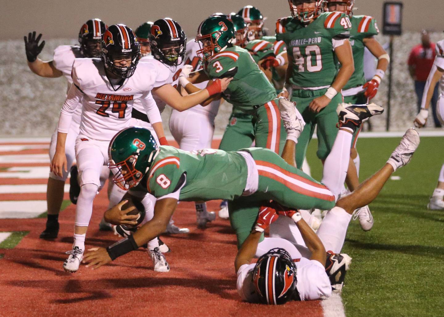 L-P quarterback Marion Persich dives into the end zone to score a touchdown against Metamora on Friday, Sept. 5, 2025 at Howard Fellows Stadium.