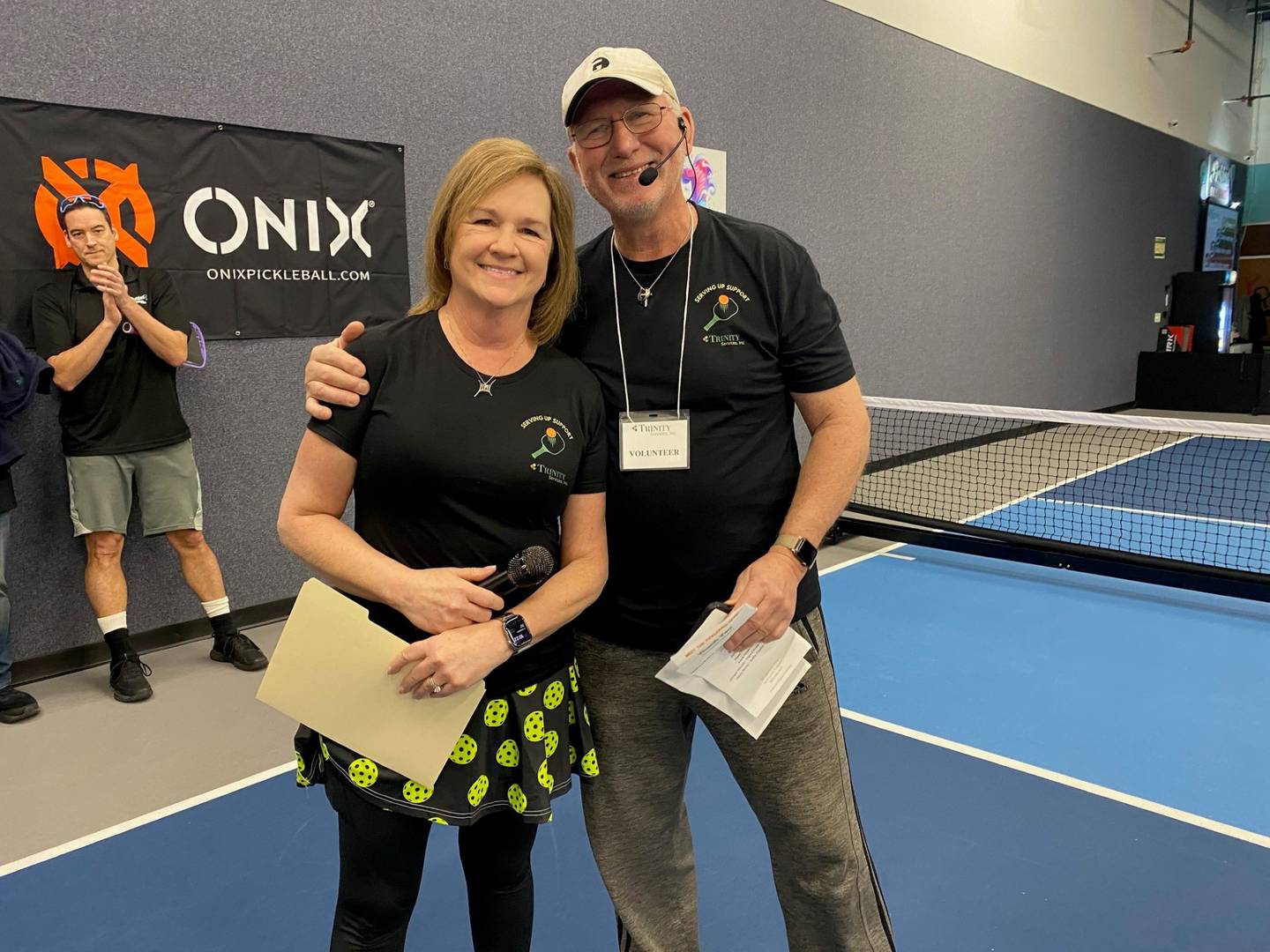 Annette Krapil, founding chair of Serving Up Support, the committee that planned and executed the pickleball fundraiser (left) is pictured with Steve Soderborg, who is active in the pickleball community. The event raised $10,000 for Trinity Services and a new research-based virtual reality training system to help people with disabilities.