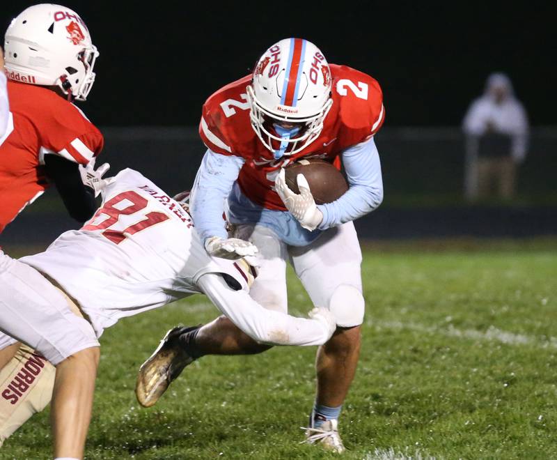 Ottawa's Packston Miller is brought down by Morris's Bryce Varner on Friday, Oct. 13, 2023 at King Field.