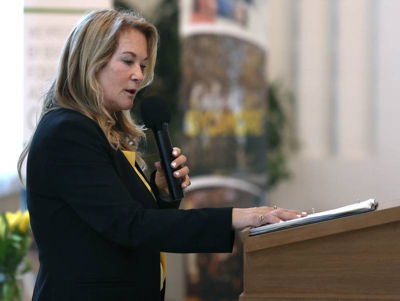 RoseMarie Treml, executive director of the Sycamore Chamber of Commerce, welcomes attendees to the chamber’s annual meeting Thursday, March 6, 2025, at St. Mary's Catholic Church in Sycamore.