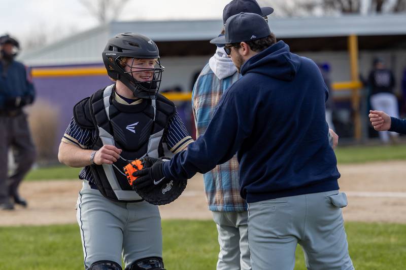 Tommy Butler of Hiawatha smiles at coach on Monday, April 7, 2025 at Serena High School in Serena.