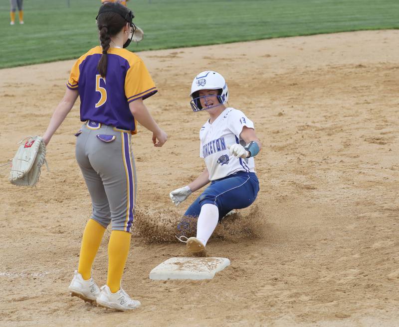 Princeton's Makayla Hecht slides into third base in Monday's regional quarterfinal against Mendota.