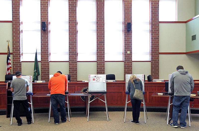 Voters from Grafton Township precincts 22 and 29 cast their ballots Tuesday, Nov. 8 2016 at the Huntley Village Hall.
