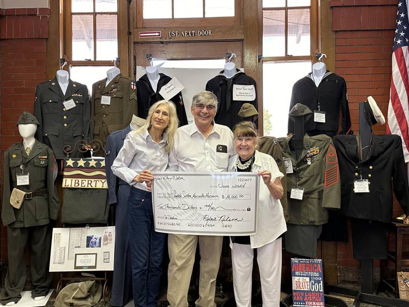 Seattle Sutton Marseilles Museum board member Robert Nelson and his wife Cheryl (left) recently gave a $10,000 donation to the Seattle Sutton Marseilles Museum.