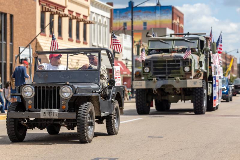 Retired military vehicles drive in parade procession on Sunday, Aug 31, 2025 at the Labor Day parade on Main Street in Streator.