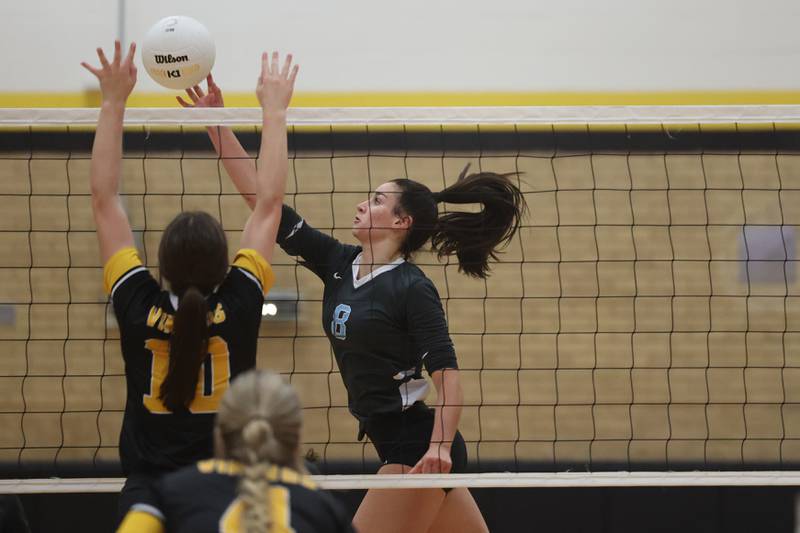 Joliet Catholic’s Olivia Chovanec hits a shot against St. Laurence in the Class 3A Hinsdale South Super-sectional on Friday