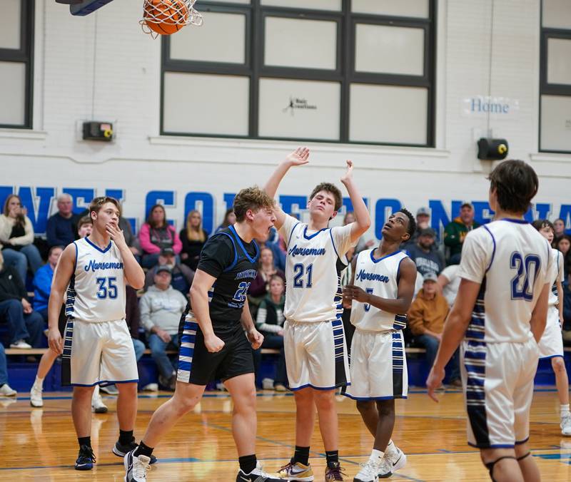 Hinckley-Big Rock's Luke Badal (23) reacts after scoring on a foul by Newark during a basketball game at Newark High School on Tuesday, January 28, 2025.