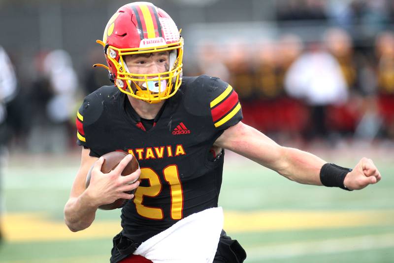 Batavia quarterback Ryan Boe keeps the ball during their Class 7A second-round playoff game in Batavia against Hersey on Saturday, Nov. 5, 2022.