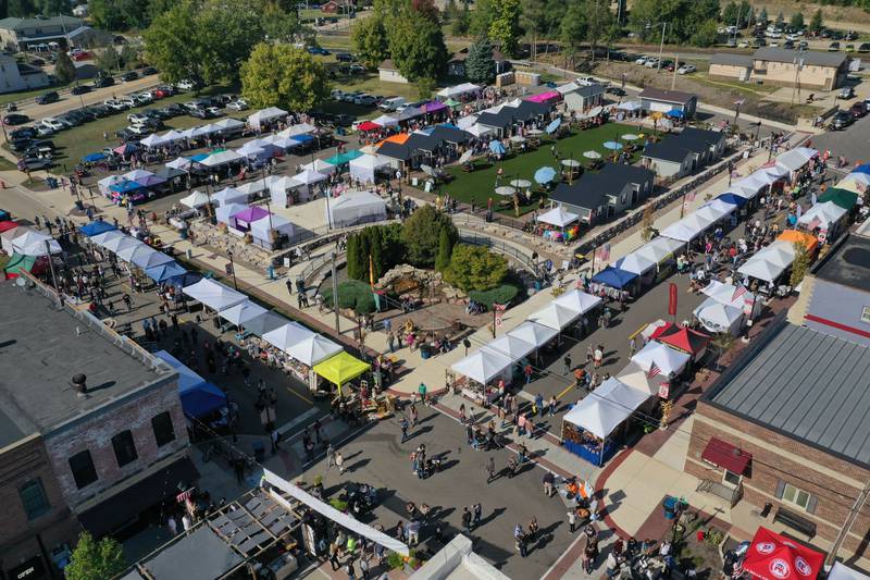 An aerial view of the corner of Mill and Church Street showing the Market on Mill area during the 55th annual Burgoo Festival on Sunday, Oct. 12, 2025 in Utica.