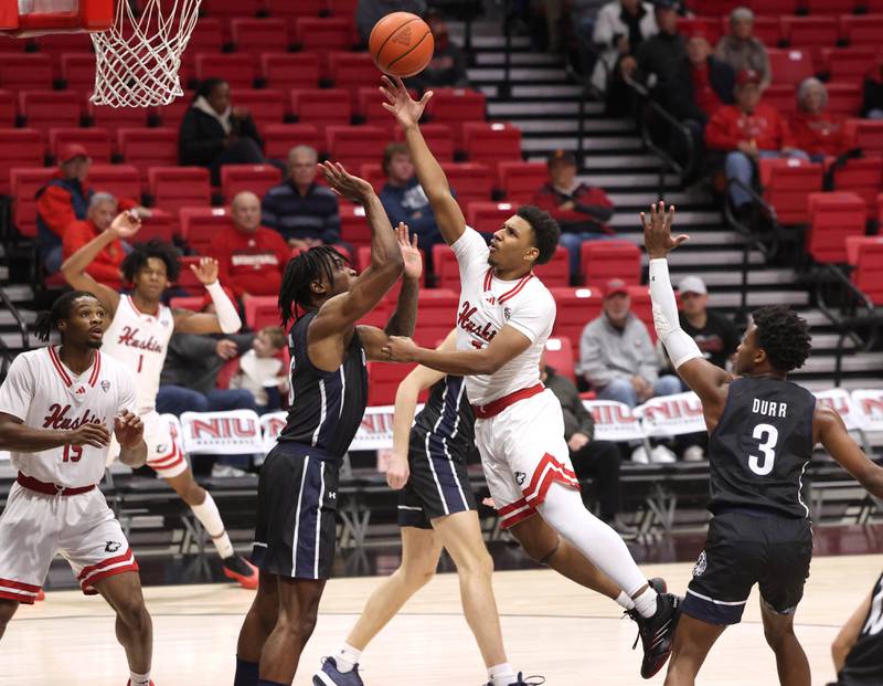 Northern Illinois' Nasir Muhammad drives against Monmouth's Jordan Meka during their game Tuesday, Nov. 12, 2024, in the Convocation Center at NIU in DeKalb.
