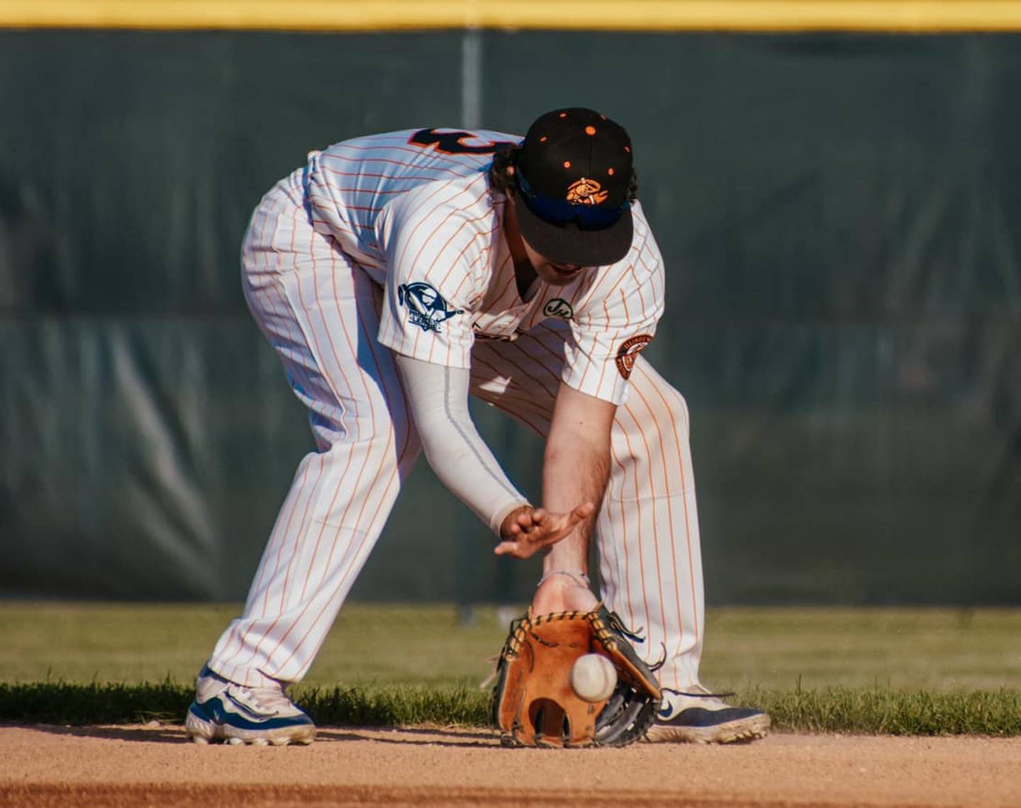 Jack Johnston fields a ground ball during the Illinois Valley Pistol Shrimp's 4-3 win over the Thrillville Thrillbillies on Monday, July 1, 2024 at Schweickert Stadium in Peru.