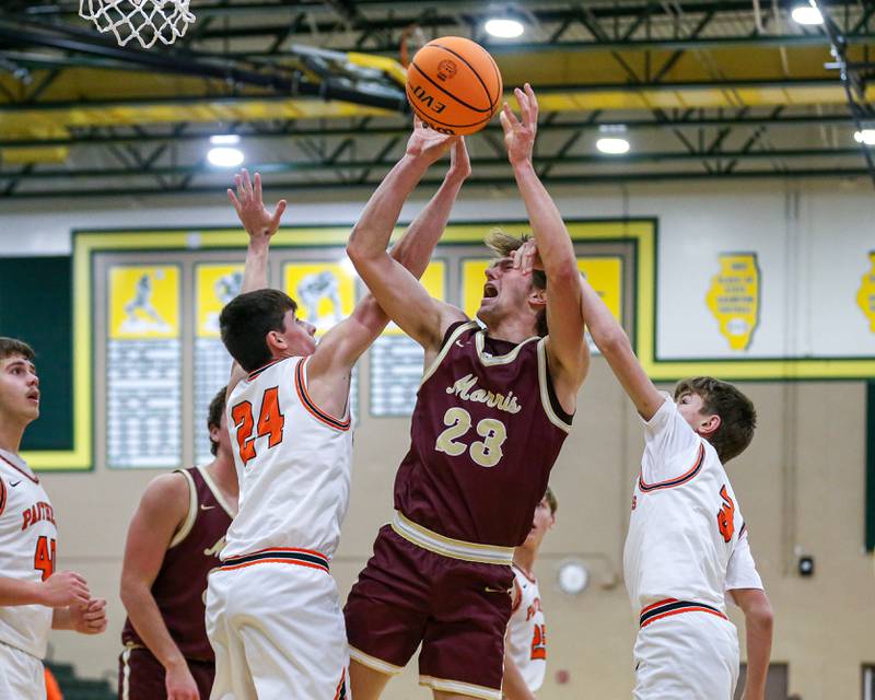 Morris's Jack Wheeler (23) puts up a shot after a rebound during their Coal City Turkey Tourney game between Morris at Gardner-South Wilmington, Tuesday November 26, 2024  in Coal City.