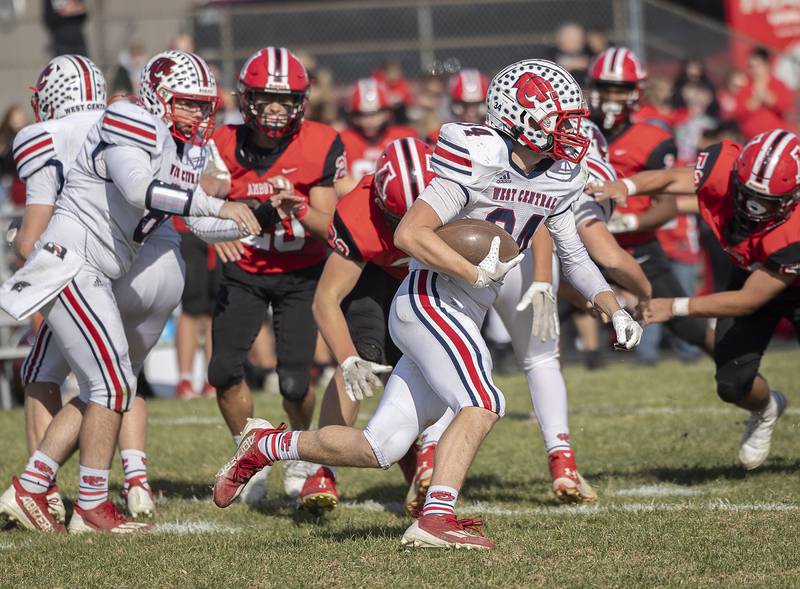 West Central’s Kyle Lafary runs against Amboy Saturday, Nov. 2, 2024, in the 8-man football league first round playoffs.