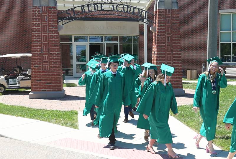 St. Bede Class of 2025 graduates walk procession during the 133rd annual commencement ceremony on Sunday, May 18, 2025 at St. Bede Academy.