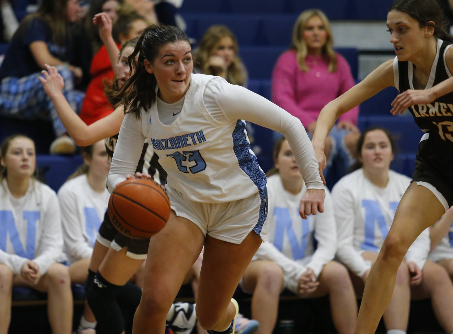Nazareth's Danielle Scully (23) goes the the basket during the girls varsity basketball game between Carmel High School and Nazareth Academy on Wednesday, Dec. 7, 2022 in LaGrange, IL.