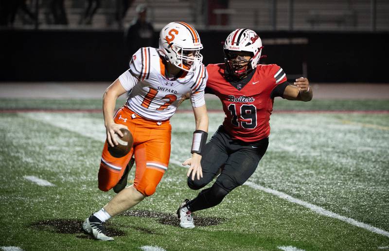 Bradley-Bourbonnais' Ty Thurmond, right, chases after Shepard's Billy Massey in a Class 6A playoff game on Friday, October 31, 2025.