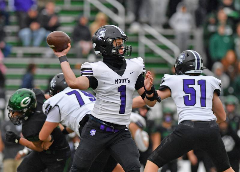 Downers Grove North quarterback Owen Lansu passes the ball during a Class 7A second-round playoff game against Glenbard West on November 8, 2025 at Glenbard West High School in Glen Ellyn.
