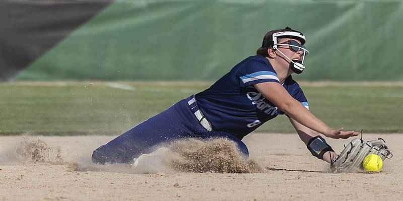 Bureau Valley’s Carly Regain is unable to snag a sinking liner against Princeton Friday, May 17, 2024 at the Class 2A regional semifinals in Rock Falls.