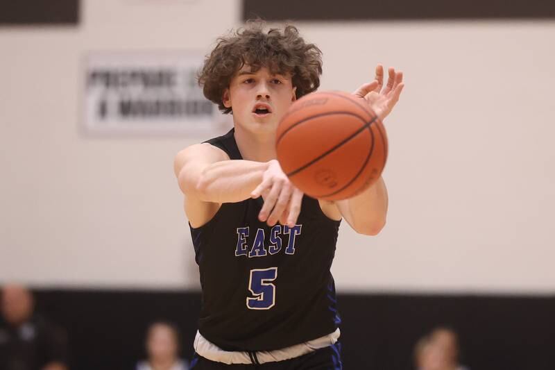 Lincoln-Way East’s Josh Boers passes the ball against Lincoln-Way West.