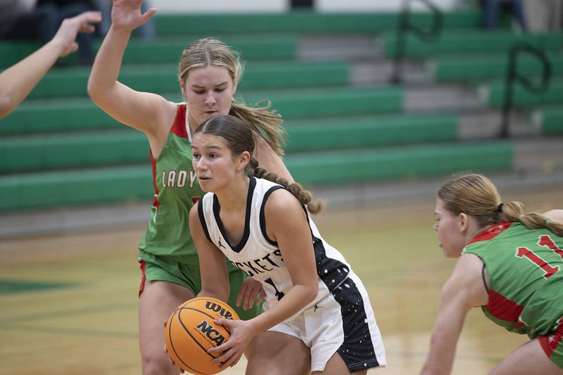 Rock Falls’ Elizabeth Lombardo looks to make a play  against L-P Saturday, Nov. 30, 2024.