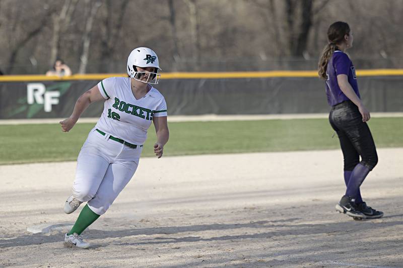 Rock Falls’ Zoe Morgan rounds third to score against Dixon Tuesday, April 11, 2023.