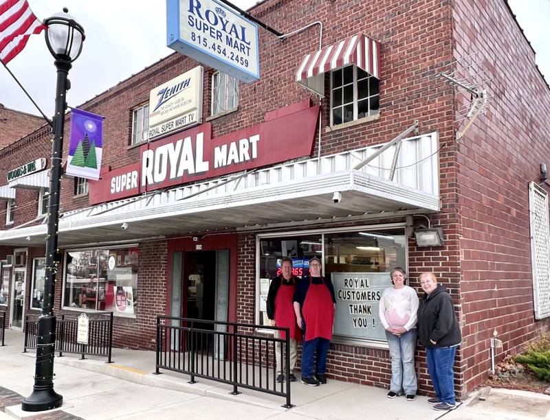 John Winger and Royal Super Mart staff, David Lanham, Patty Gould, and Jackie Burt who will return when the store re-opens summer 2023