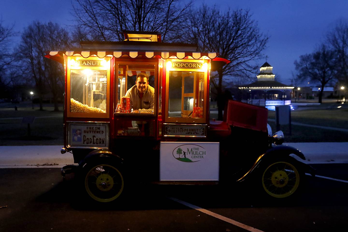 Scott Uglinica, of Volo, with a 1928 Ford Model Popcorn Wagon on Wednesday, Jan. 18, 2023, at Veterans Memorial Park in McHenry.
