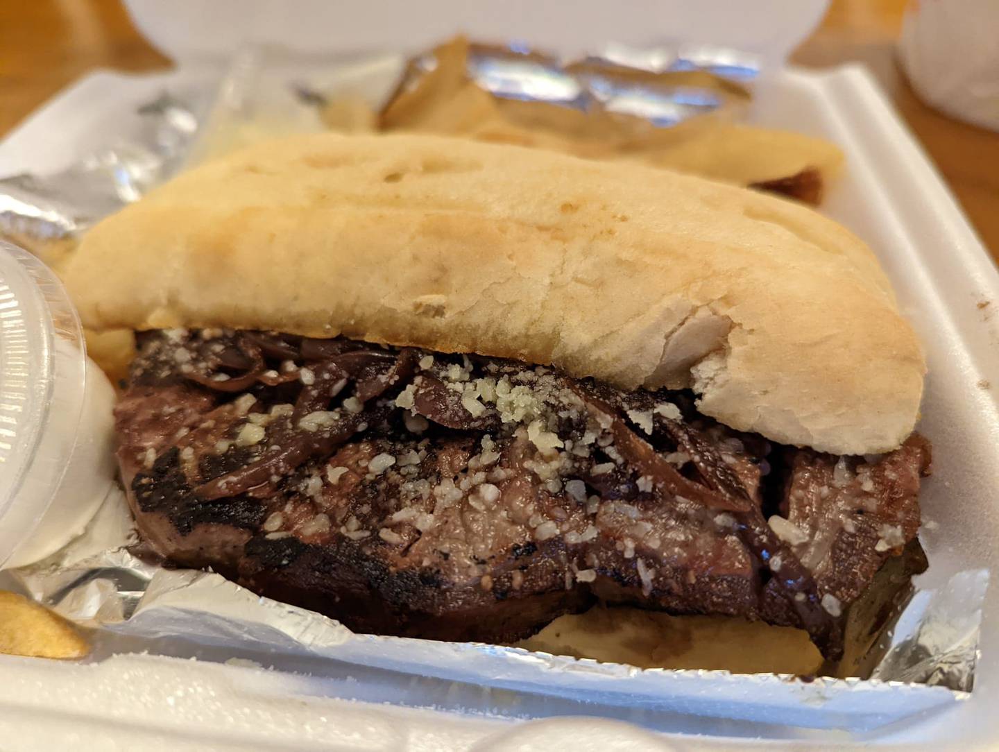 The steak sandwich at Al's Steak House in Joliet comes with carmelized onions, parmesan cheese, horseradish sauce and garlic butter.