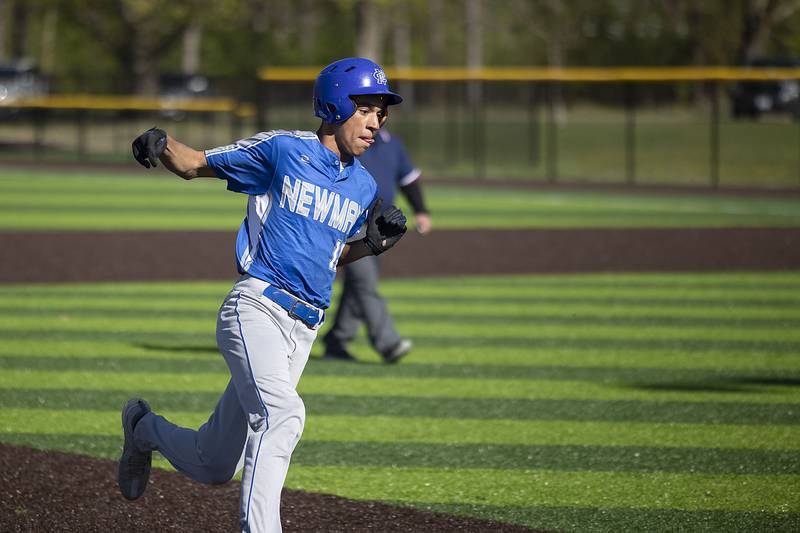 Newman’s Isaiah  Williams rounds third against Sterling Wednesday, May 3, 2023.