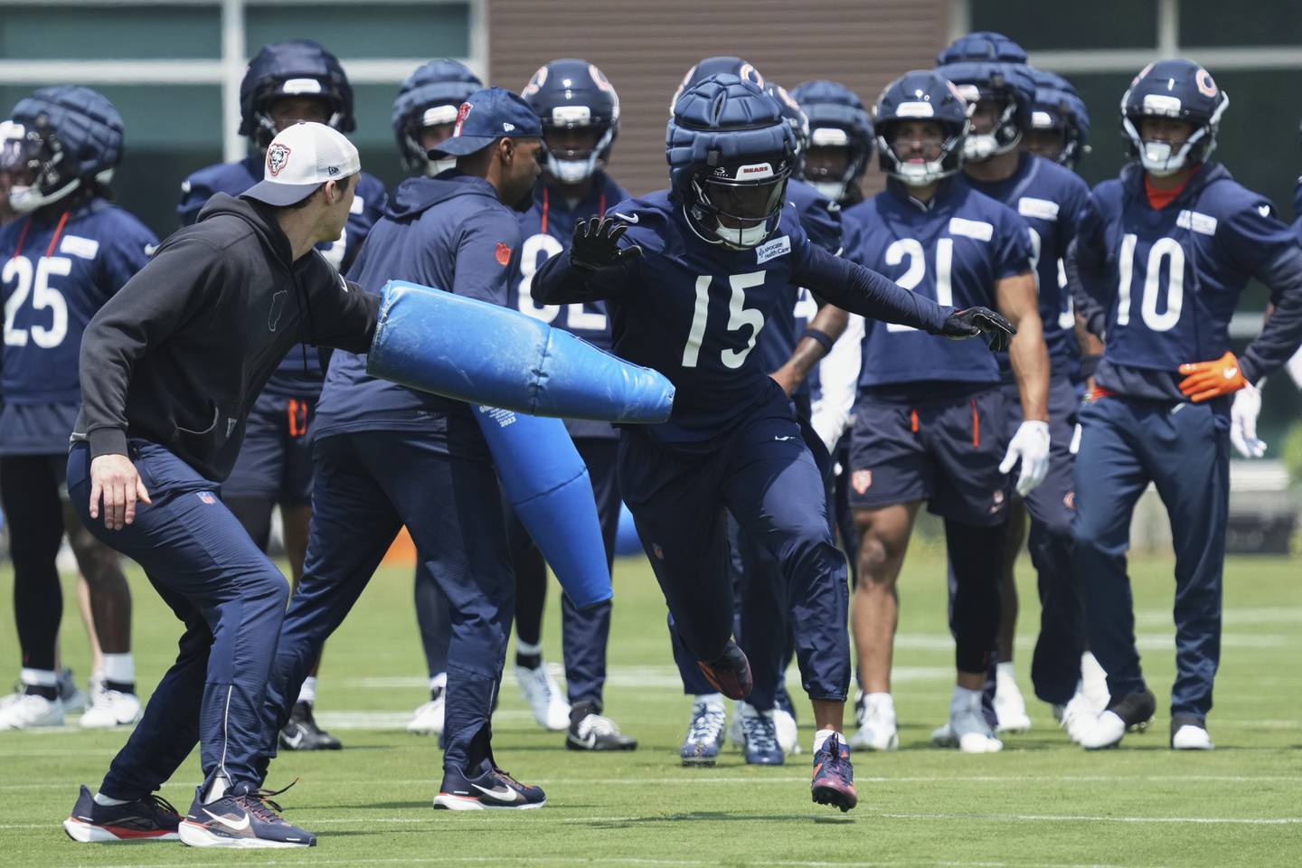 Chicago Bears wide receiver Rome Odunze (15) works on the field during NFL football practice at Halas Hall in Lake Forest, Ill., Thursday, June 5, 2025. (AP Photo/Nam Y. Huh)