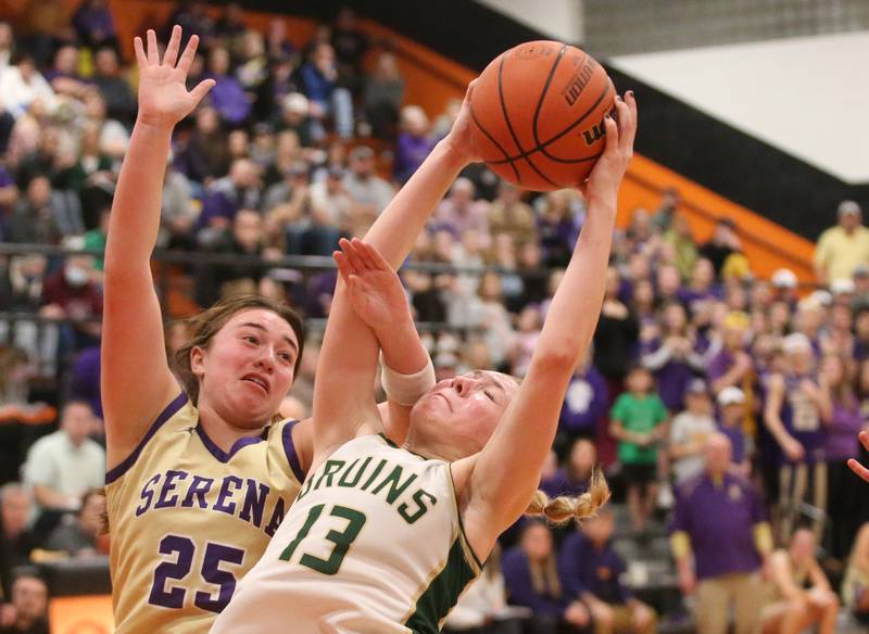 St. Bede's Ashlyn Ehm grabs a rebound over Serena's Maddie Glade during the Class 1A Sectional final game on Thursday, Feb. 22, 2024 at Gardner-South Wilmington High School.