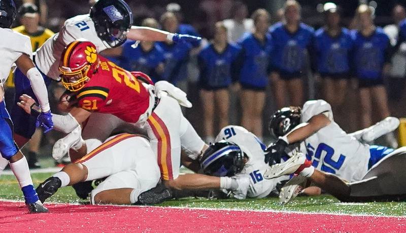 Batavia’s Ryan Boe (21) dives in for a touchdown on a keeper against Lincoln-Way East during a football game at Batavia High School on Friday, Sep 1, 2023.