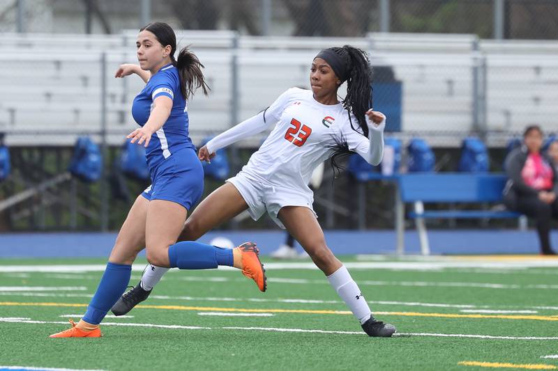 Plainfield East’s Kessiah Purnell eyes her shot as it finds the back of the net against Joliet Central on Thursday, April 11, 2024.