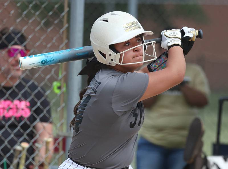 Sycos’ Jasmine Rodriguez hits a home run Friday, June 27, 2025, during their 16u game against Select Fastpitch in the Storm Days tournament at the Sycamore Community Sports Complex.