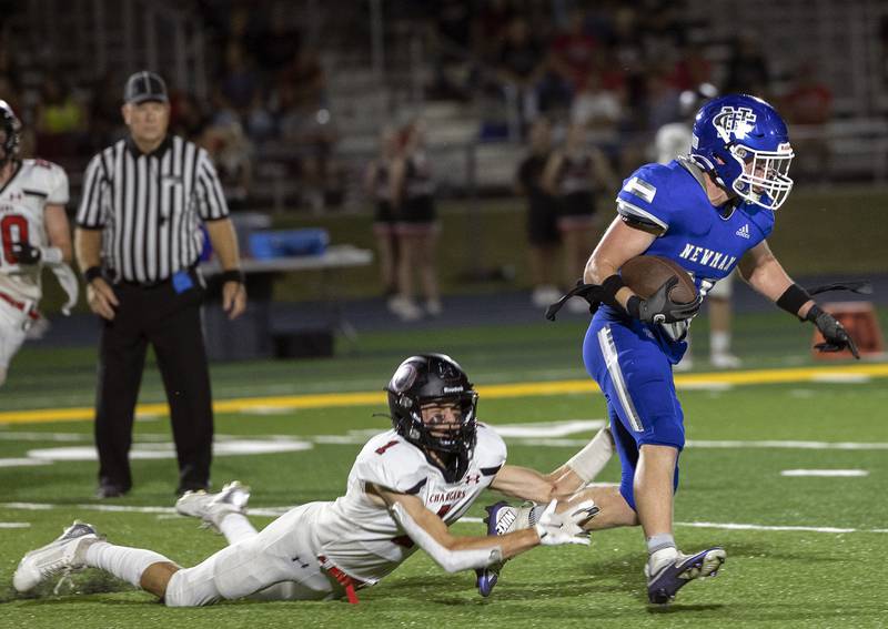 Newman’s Briar Ivey picks up yards against Orion’s Owen Voorhees Friday, Sept. 20, 2024, at Roscoe Eades Stadium in Sterling.