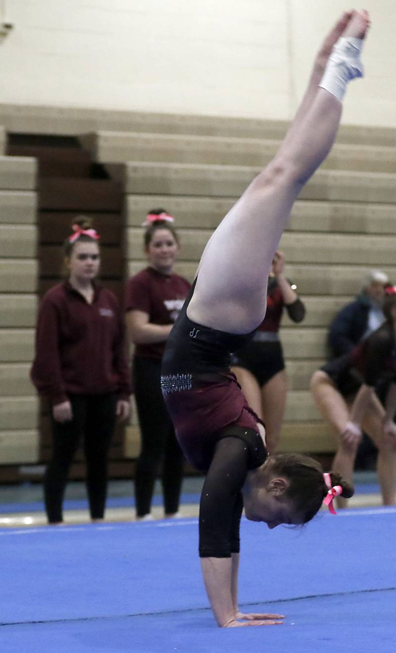 Prairie Ridge’s Delaney Wolfe competes in floor exercise Wednesday, Feb. 8, 2023, during  the IHSA Stevenson Gymnastics Sectional at Stevenson High School in Lincolnshire.