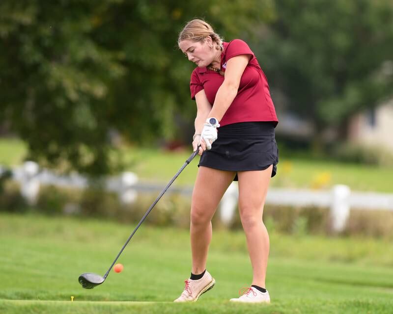 Naperville Central Poppy Marusin tee off during the back half of the regional match Thursday Sep. 28, 2023, held at Whitetail Ridge in Yorkville.