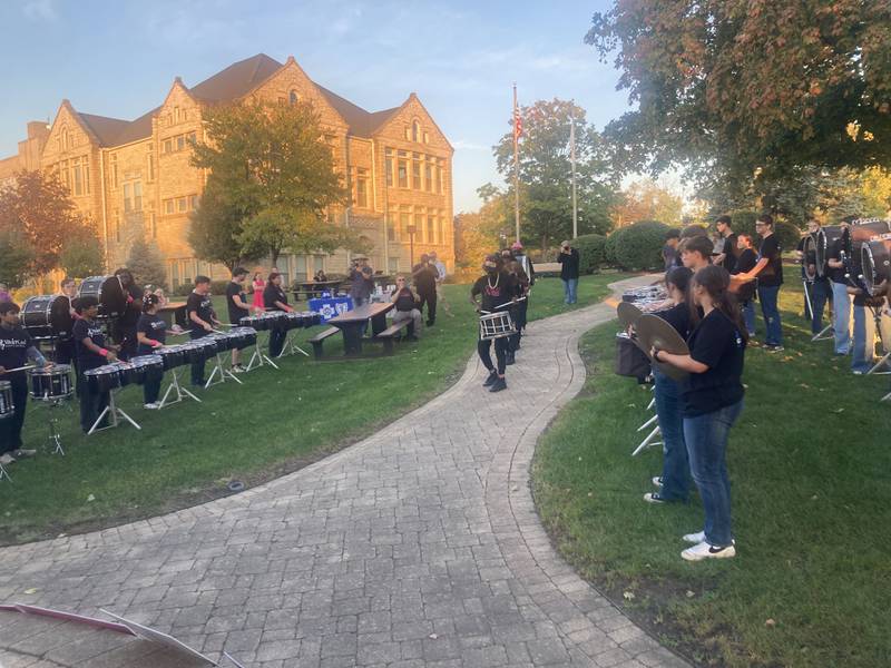 Members of Kaotic, the Carl Sandburg High School marching band, and the VanderCook drum line perform together at the Let's Beat Breast Cancer Rally.
Thursday, Oct. 16, 2025.