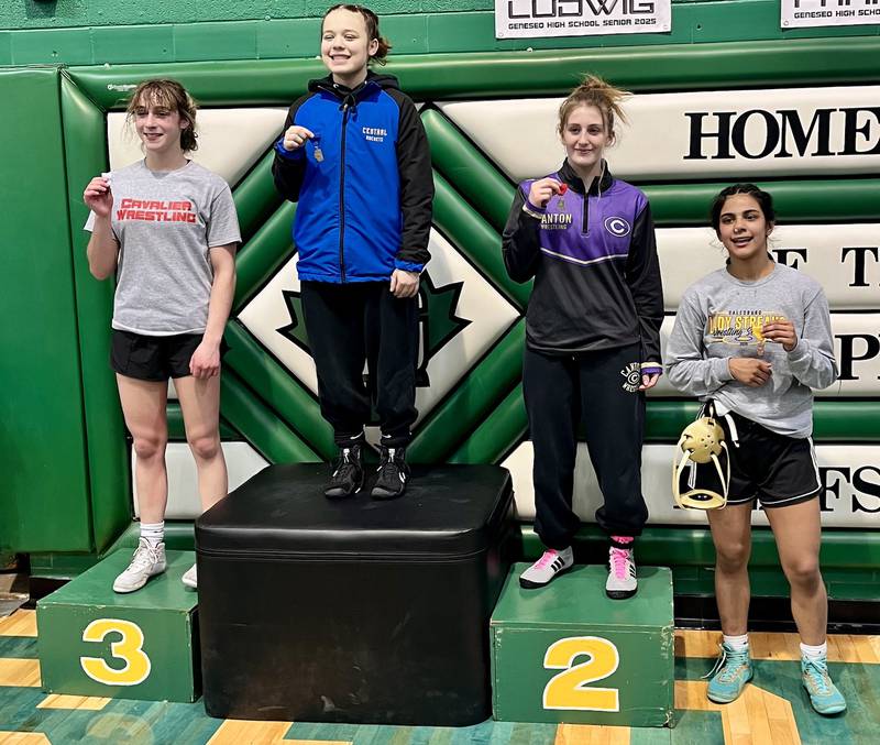 La Salle-Peru's Kiely Domyancich (left) accepts her third-place medal in the 115-pound class at the Geneseo Sectional on Saturday, Feb. 15, 2025.