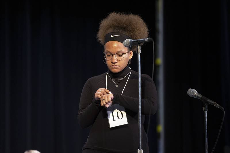 Byron Middle School eighth grader Miya Dunk appears on stage Thursday, March 9, 2023 during the Lee-Ogle-Whiteside Regional Spelling Bee.