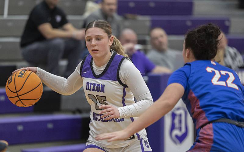 Dixon’s Presley Lappin handles the ball against G-K’s Regan Creadon Tuesday, Jan. 27, 2026.