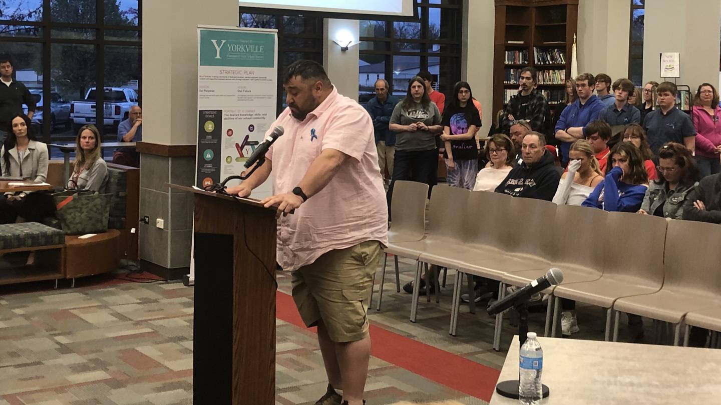 Casey Cantwell speaks before the Yorkville School District 115 board during public comment of a School Board meeting on April 22, 2024, in the Yorkville High School Library.