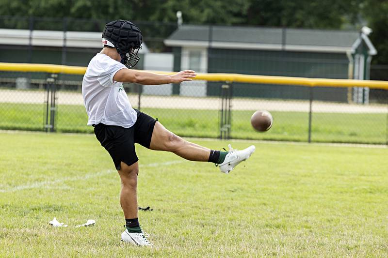 Rock Falls players run through drills Tuesday, August 8, 2023 during the first week of football practice.