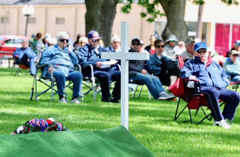 A cross marks a memorial grave during Monday's Memorial Day Services in Princeton.