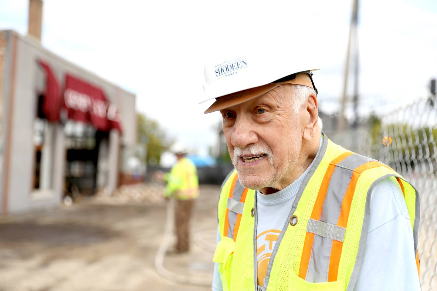 Elis Giannini watches as demolition begins on Monday, Sept. 23, 2024 at Geneva Cycle Shop, located at 12 E. State St. in Geneva. Giannini began his shop there in 1976 and sold to Wessel Court East LLC in April.