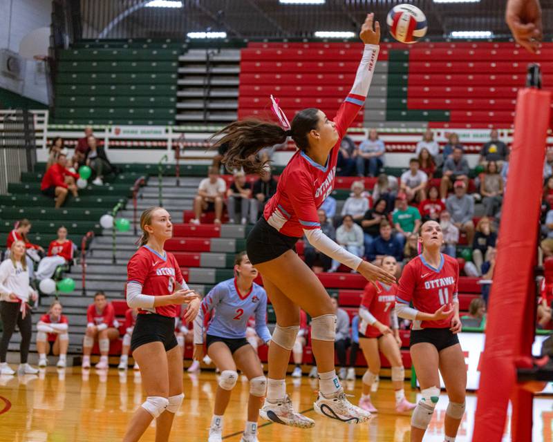 Ottawa High School's Bella Knoll spikes the ball during the match at Sellett Gym on Oct. 15, 2025 at LaSalle-Peru High School.
